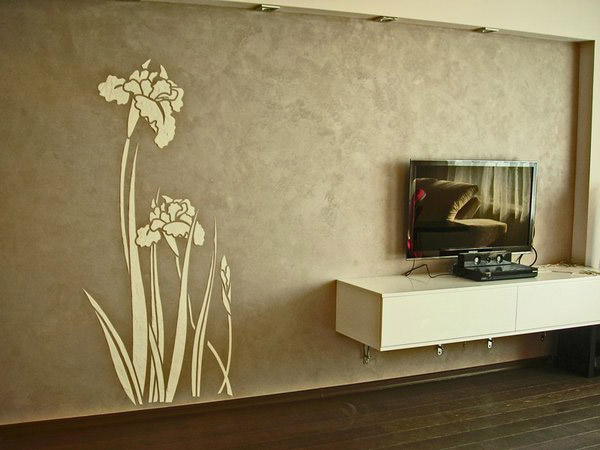 Iris motif cut in stencil and raised in plaster over a polished Venetian wall — YZ Painting & Finishing, Greater Vancouver