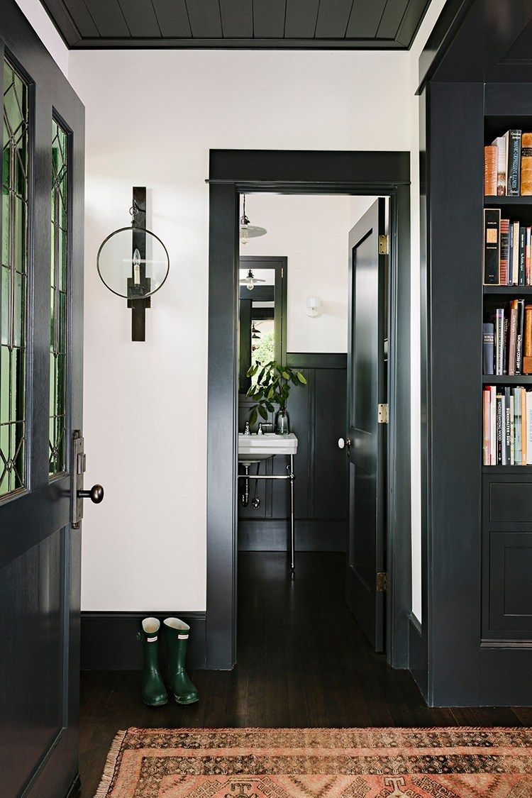 Contrast trim: dark enamel on casings, baseboards and doors against light walls — YZ Painting & Finishing, Greater Vancouver